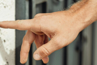 Canvasser ringing a doorbell