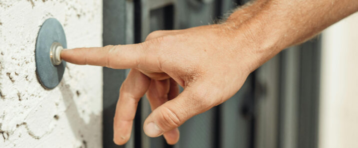 Canvasser ringing a doorbell