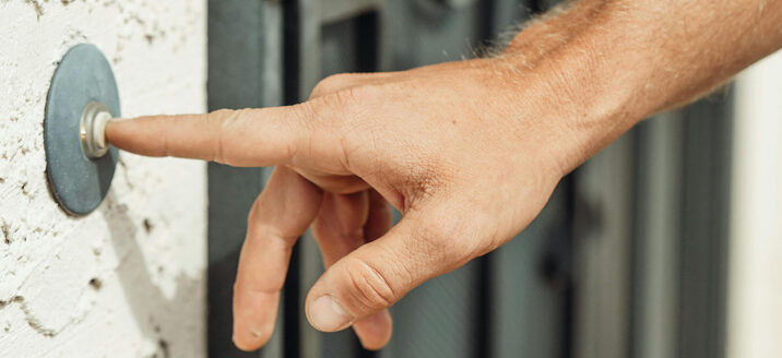 Canvasser ringing a doorbell