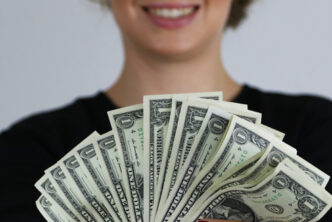 Donor with dollar bills